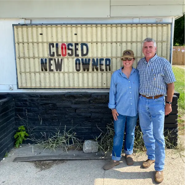 Gigi Howell and Bourke Harvey outside the future JD's Hamburgers before opening