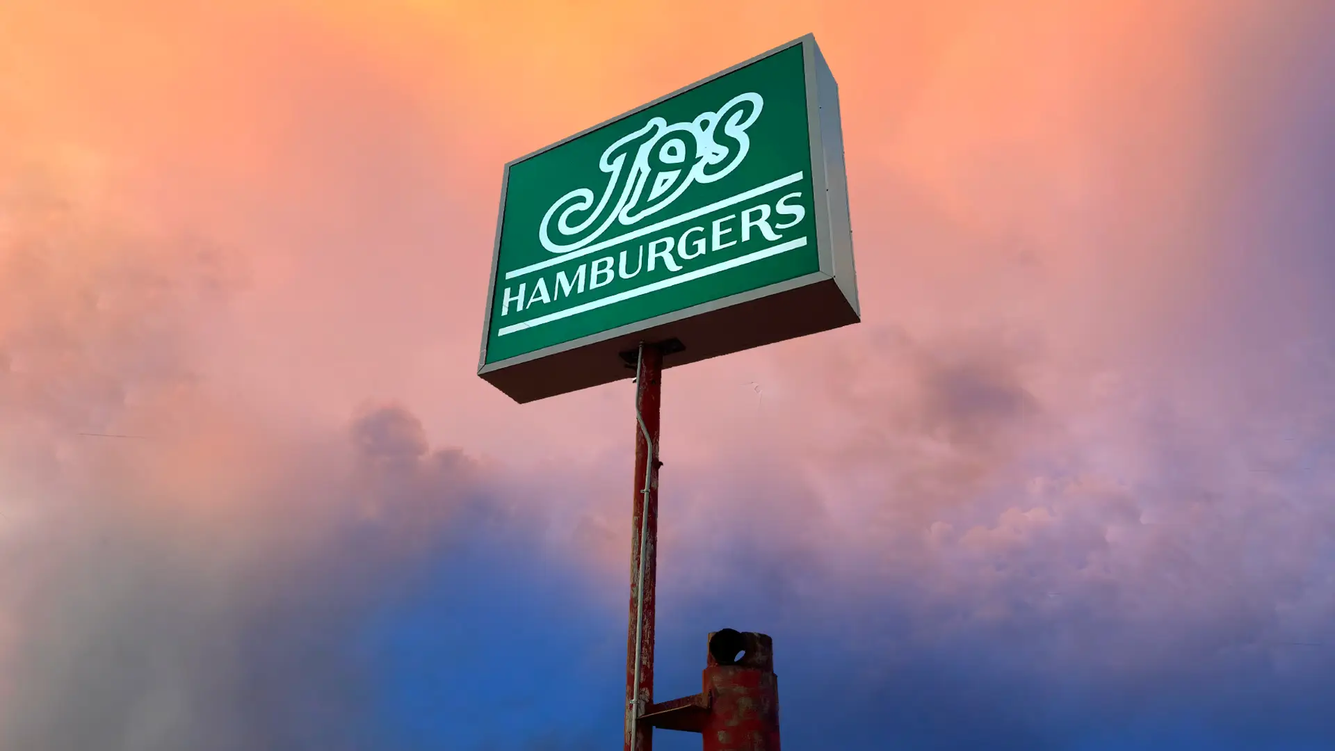 JD's Hamburgers roadside sign at sunset in Westland, Fort Worth